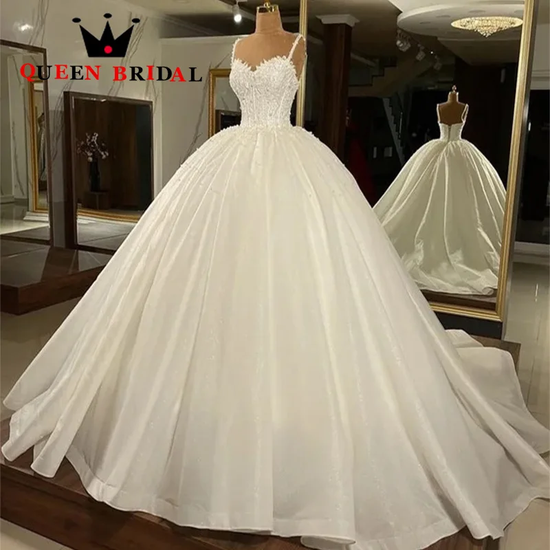 Exquisite Spaghetti Straps Wedding Dresses Sleeveless Pearls V Neck Backless Bride Ball Gowns Vestido De Novia Custom Y13WM
Exquisite Spaghetti Straps Wedding Dresses Sleeveless Pearls V Neck Backless Bride Ball Gowns Vestido De Novia Custom Y13WM