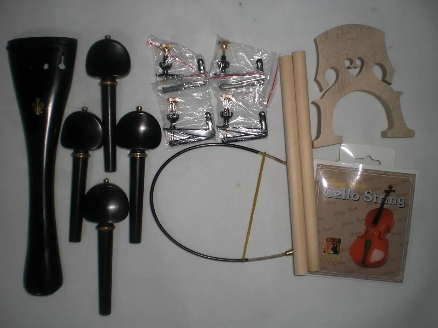 Ebony Cello Parts with Brass Decoration+Cello String adjuster+Nylon tail gut+sound post+cello bridge etc all 4/4
Ebony Cello Parts with Brass Decoration+Cello String adjuster+Nylon tail gut+sound post+cello bridge etc all 4/4
