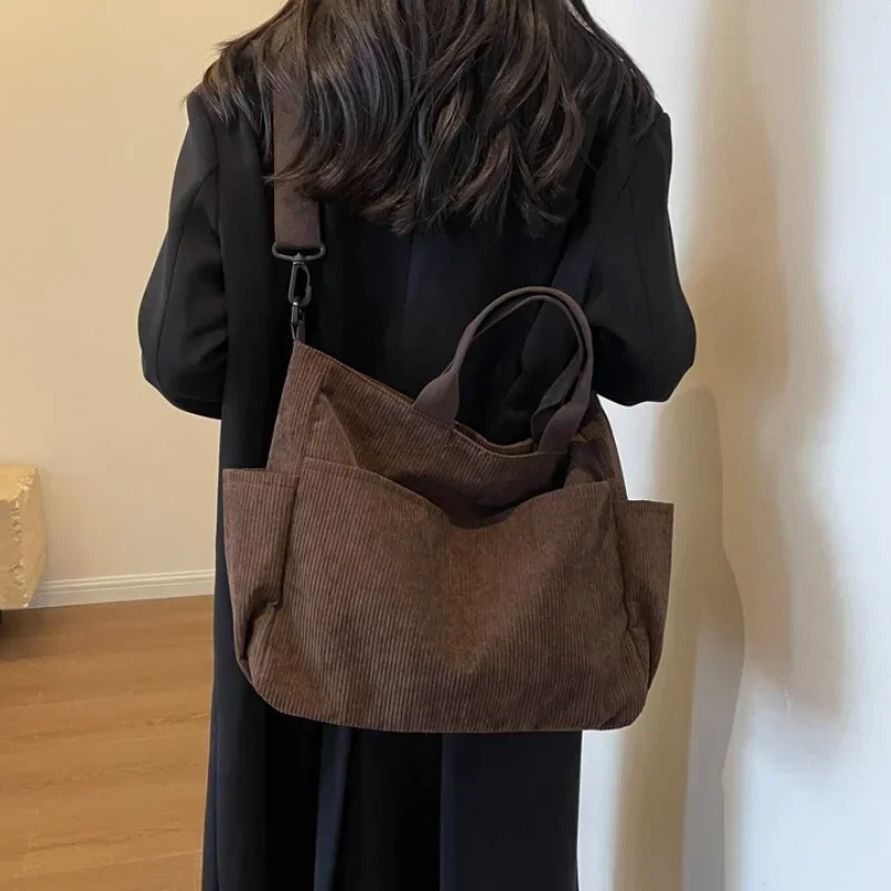 Simple Color Multi-pocket Corduroy Tote Bag Large-capacity Casual Backpack Suitable for Outdoor Travel Commuting Work Handbags
Simple Color Multi-pocket Corduroy Tote Bag Large-capacity Casual Backpack Suitable for Outdoor Travel Commuting Work Handbags