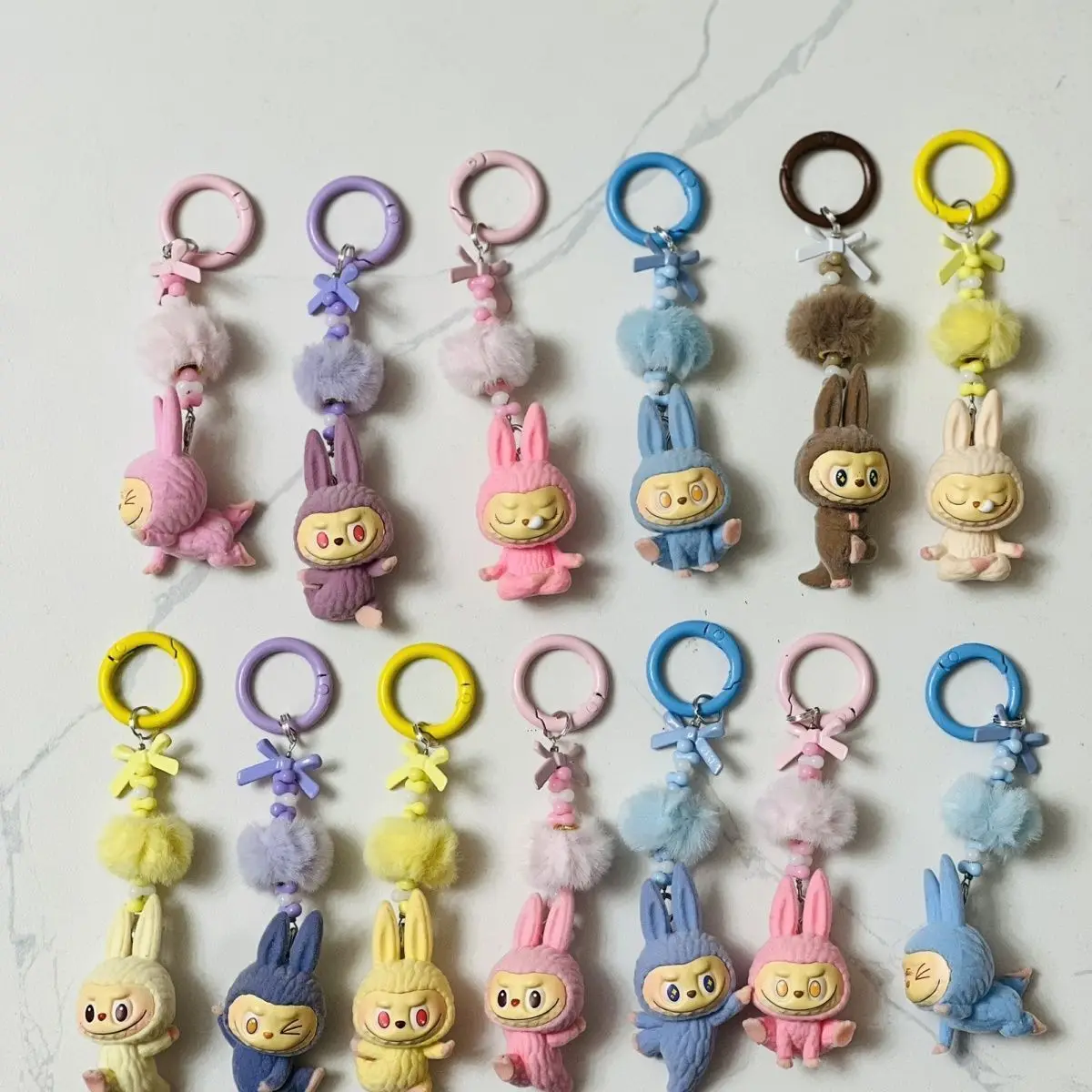 New mini Labubu keychain Yoga models cartoon cute three-dimensional doll backpack decoration pendant car keychain men and women
New mini Labubu keychain Yoga models cartoon cute three-dimensional doll backpack decoration pendant car keychain men and women