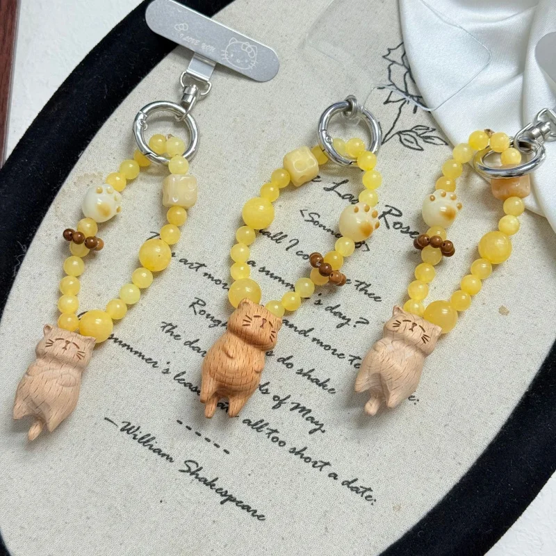 Natural Mellow Jade beads, calcite stone, Bodhi cat paw and dice, sandalwood carved cute cat handmade mobile phone bag pendant
Natural Mellow Jade beads, calcite stone, Bodhi cat paw and dice, sandalwood carved cute cat handmade mobile phone bag pendant