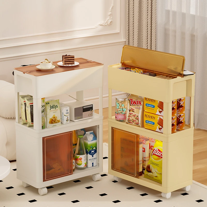 Mobile Snack Cart - Multi-Layer Organizing Shelf with Push-Pull Door Versatile and Practical Storage for Living Room and Kitchen
Mobile Snack Cart - Multi-Layer Organizing Shelf with Push-Pull Door Versatile and Practical Storage for Living Room and Kitchen