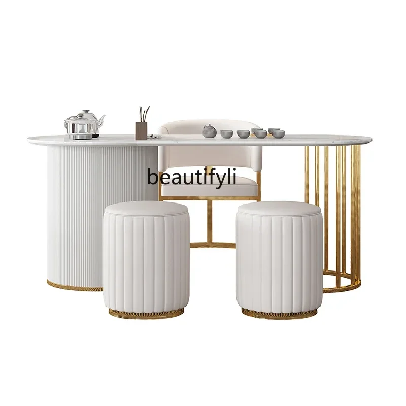 Light luxury home rock slab tea table table and chair set combination office home kung fu tea table
Light luxury home rock slab tea table table and chair set combination office home kung fu tea table