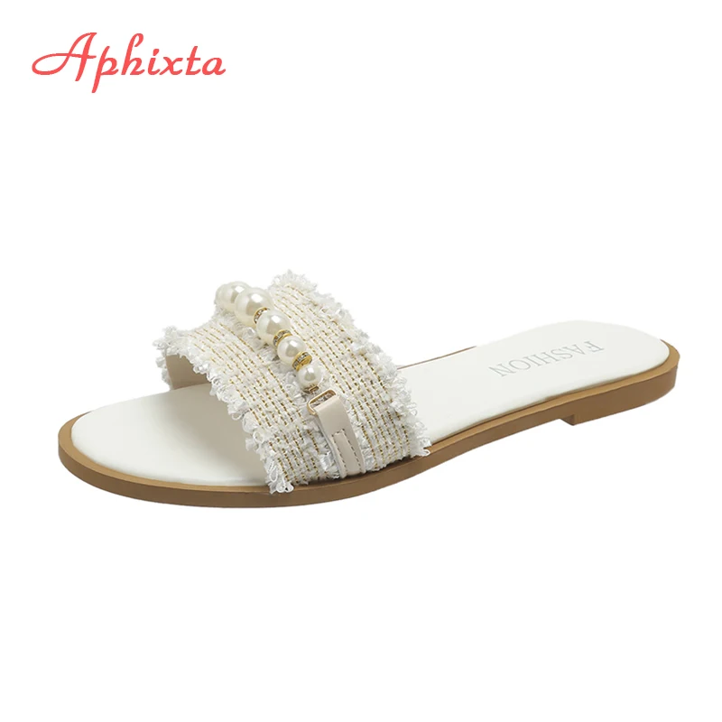Aphixta тканевые бежевые шлепанцы из бисера на плоской подошве с сандалиями, женская летняя обувь с круглым носком, уличные шлепанцы, роскошная дизайнерская обувь с жемчугом
Aphixta тканевые бежевые шлепанцы из бисера на плоской подошве с сандалиями, женская летняя обувь с круглым носком, уличные шлепанцы, роскошная дизайнерская обувь с жемчугом