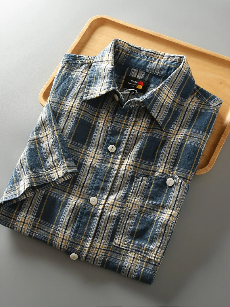 Новая летняя свободная мужская рубашка из хлопка с коротким рукавом, в клетку, с отложным воротником, повседневная, в японском стиле, дышащая, молодежная, модная
Новая летняя свободная мужская рубашка из хлопка с коротким рукавом, в клетку, с отложным воротником, повседневная, в японском стиле, дышащая, молодежная, модная