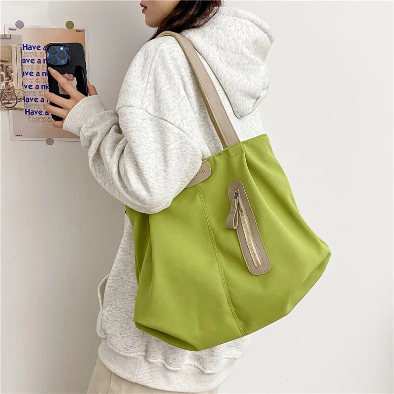 2024 New Casual Shoulder Large Capacity Bag with High Appearance and Versatile Nylon Student Commuting Tote Bag
2024 New Casual Shoulder Large Capacity Bag with High Appearance and Versatile Nylon Student Commuting Tote Bag