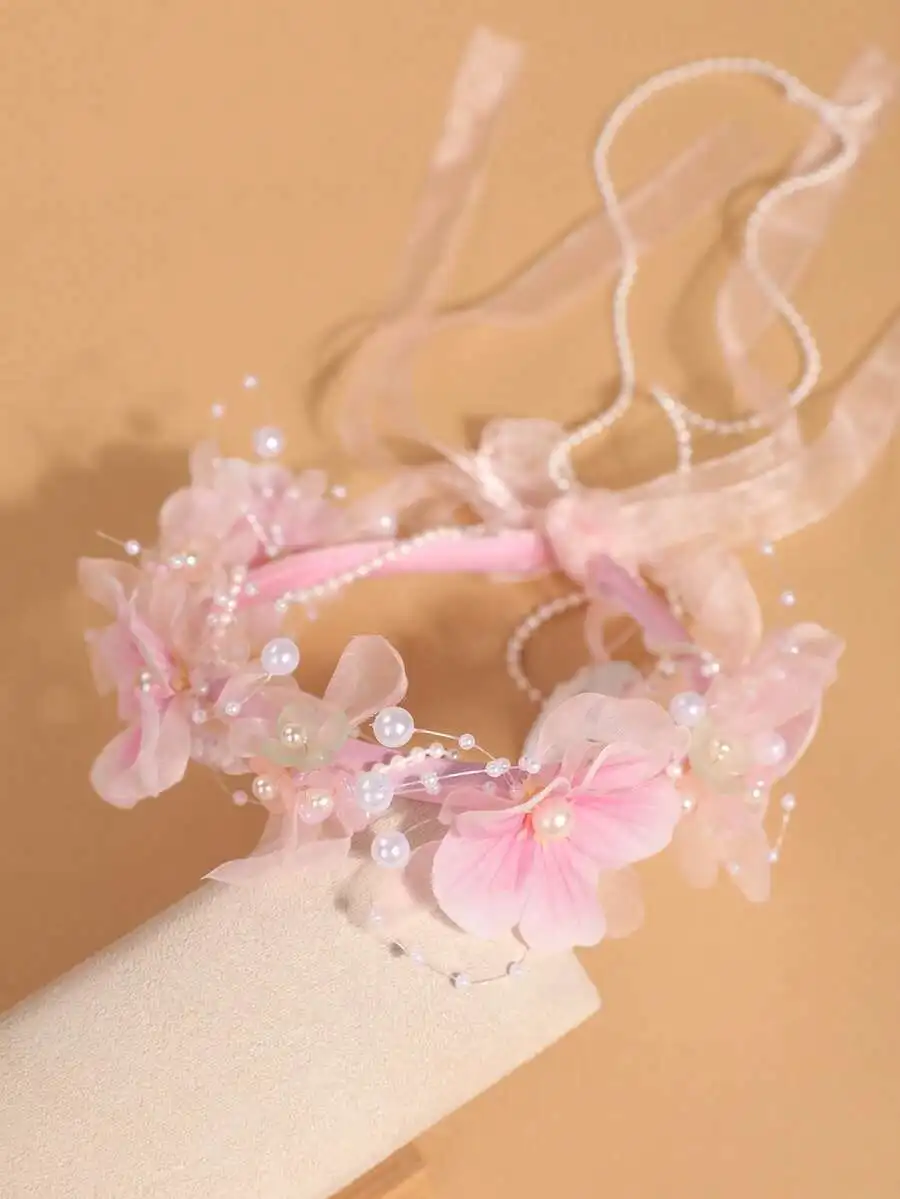 Pink Faux Flower Crown With Pearl-String Details, Sheer Ribbon Ties And Delicate Blossoms For Girls Casual Or Party Hairwear
Pink Faux Flower Crown With Pearl-String Details, Sheer Ribbon Ties And Delicate Blossoms For Girls Casual Or Party Hairwear
