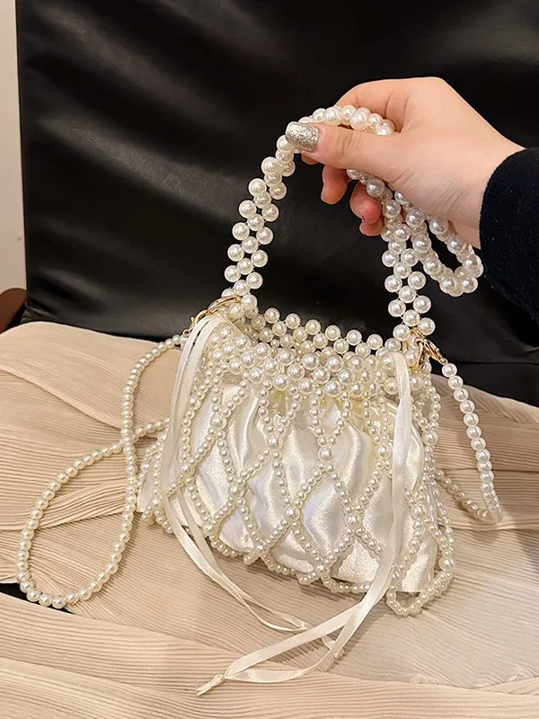 Elegant Pearl Woven Women Mini Bag 2026 New Drawstring Ribbon Handbag Party Evening Crossbody Bag
Elegant Pearl Woven Women Mini Bag 2026 New Drawstring Ribbon Handbag Party Evening Crossbody Bag