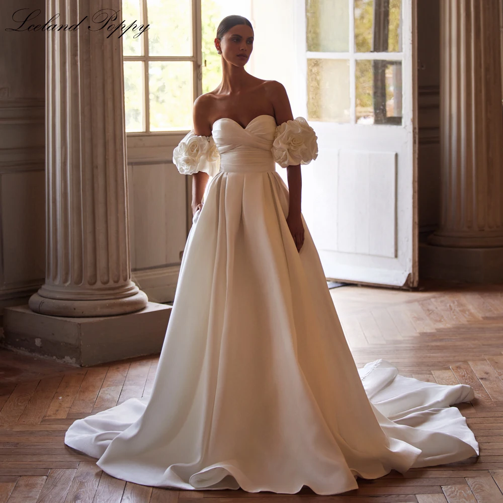 Lceland Poppy Customized A Line Strapless Satin Wedding Dresses Pleated Bridal Gowns with Removable Sleeves
Lceland Poppy Customized A Line Strapless Satin Wedding Dresses Pleated Bridal Gowns with Removable Sleeves