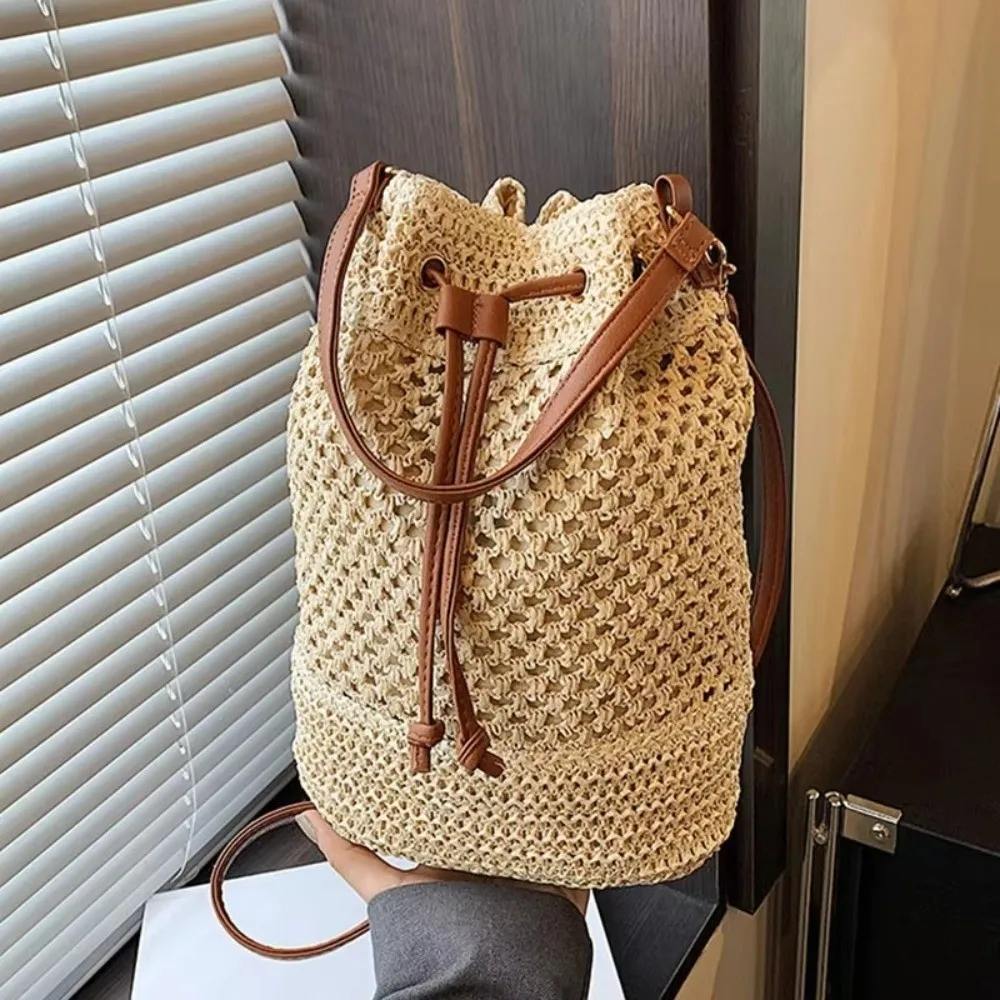 Fashion Large Capacity Weaving Bag Hollow Out Leather Strap Straw Beach Bag Drawstring Closure Bucket Bag Summer
Fashion Large Capacity Weaving Bag Hollow Out Leather Strap Straw Beach Bag Drawstring Closure Bucket Bag Summer