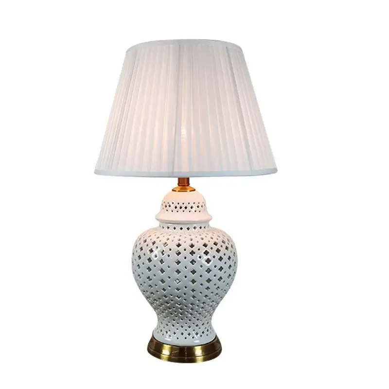 White hollow ceramic living room table lamp bedroom bedside lamp hotel villa model room decorative lamps
White hollow ceramic living room table lamp bedroom bedside lamp hotel villa model room decorative lamps