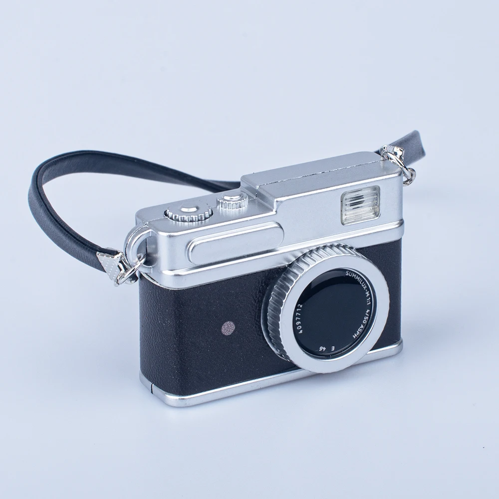 Mini Light up small camera miniature SLR simulation digital camera model Small toys children doll house accessories
Mini Light up small camera miniature SLR simulation digital camera model Small toys children doll house accessories