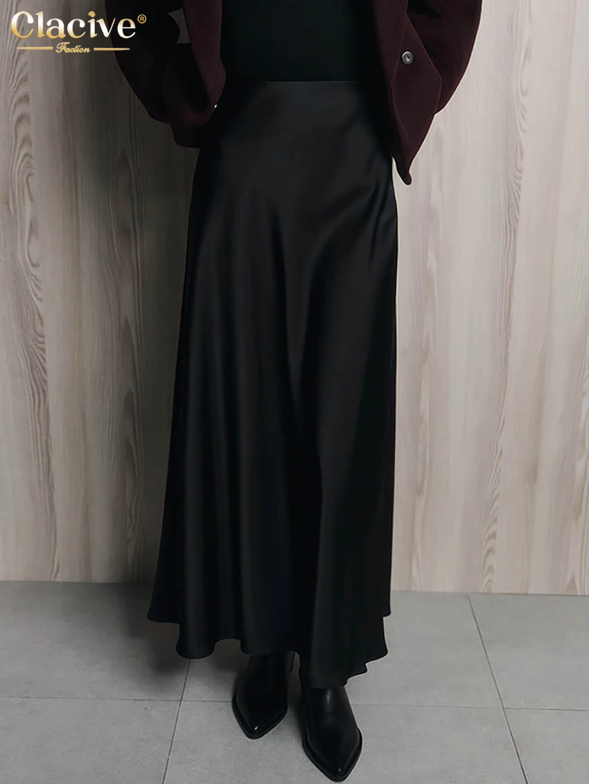Повседневная свободная черная атласная женская юбка Clacive 2026: модная длинная юбка с высокой талией, элегантная классическая однотонная юбка, женская одежда
Повседневная свободная черная атласная женская юбка Clacive 2026: модная длинная юбка с высокой талией, элегантная классическая однотонная юбка, женская одежда