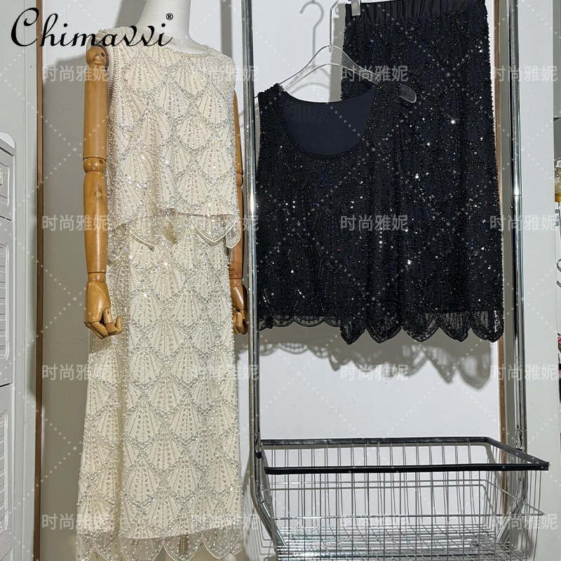 Fashion New French Sleeveless Top 2025 Summer New Heavy Industry High-waist Skirt Sequined Beaded Slim Vest Womens Skirt Sets
Fashion New French Sleeveless Top 2025 Summer New Heavy Industry High-waist Skirt Sequined Beaded Slim Vest Womens Skirt Sets