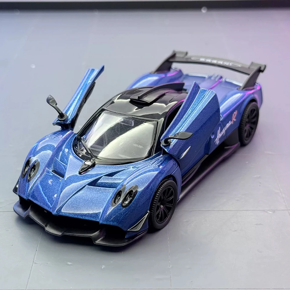 1:32 Pagani Huayra R Alloy BC, литые модели, игрушки, автомобильные двери, открытый звук, свет, откат, миниатюрные автомобили, коллекционные украшения для мальчиков
1:32 Pagani Huayra R Alloy BC, литые модели, игрушки, автомобильные двери, открытый звук, свет, откат, миниатюрные автомобили, коллекционные украшения для мальчиков
