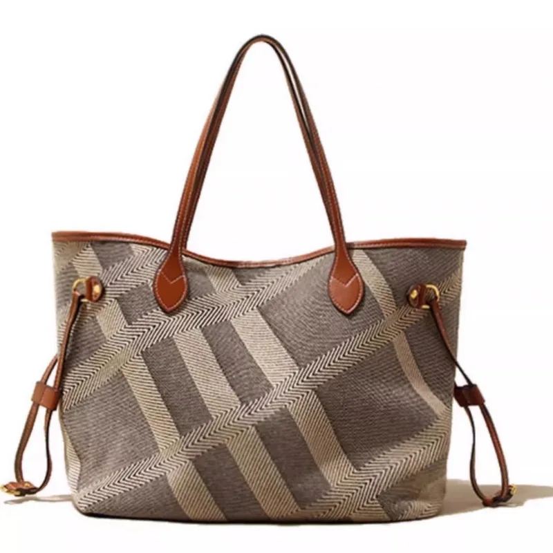 Luxury designer Tote Bag women 2025 new in High Quality Striped Canvas Handbags and Purses simplicity Elegant trend Shoulder Bag
Luxury designer Tote Bag women 2025 new in High Quality Striped Canvas Handbags and Purses simplicity Elegant trend Shoulder Bag