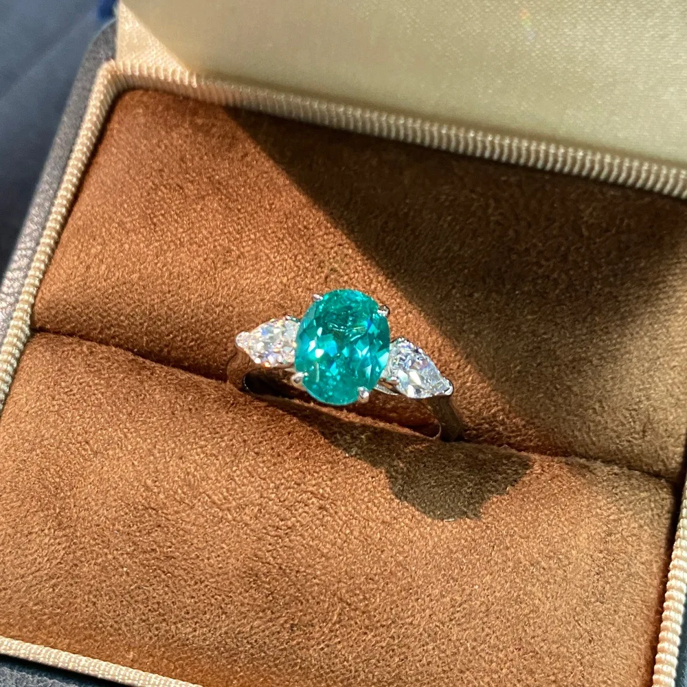 925 sterling silver cultivated Paraiba topaz ring 7 * 9mm all-pure body quality fire color niche design
925 sterling silver cultivated Paraiba topaz ring 7 * 9mm all-pure body quality fire color niche design