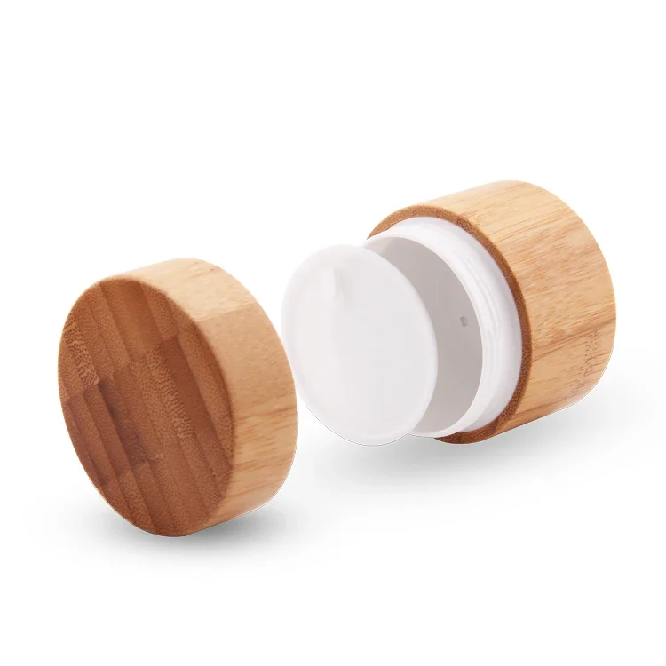Natural eco friendly bamboo cosmetic plastic packaging bamboo cosmetic jar wooden cream jar with inner pp plastic made in China 
Natural eco friendly bamboo cosmetic plastic packaging bamboo cosmetic jar wooden cream jar with inner pp plastic made in China