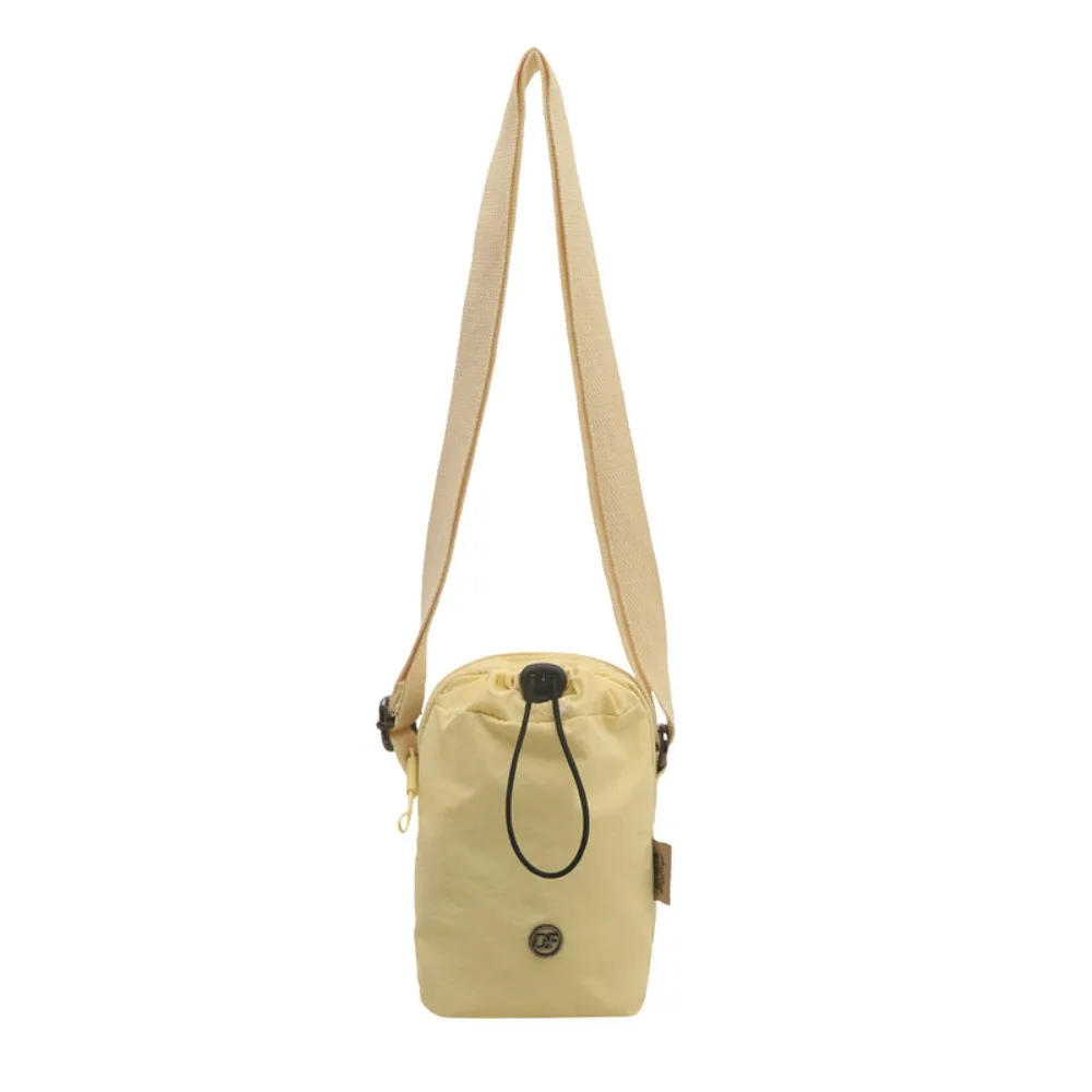 Solid Color Mini Nylon Crossbody Bag Zipper Multifunctional Water Bottle Bag Ultra-light Storage Bag Drawstring Small Square Bag
Solid Color Mini Nylon Crossbody Bag Zipper Multifunctional Water Bottle Bag Ultra-light Storage Bag Drawstring Small Square Bag