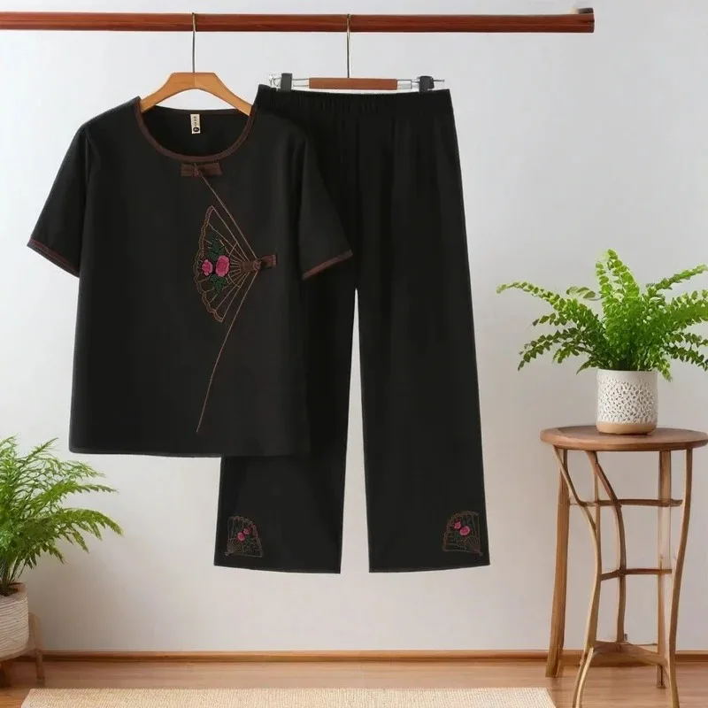 Women's Ethnic Floral Embroidery Short Sleeve Top Wide Leg Pants Casual Summer 2-Piece Set
Women's Ethnic Floral Embroidery Short Sleeve Top Wide Leg Pants Casual Summer 2-Piece Set