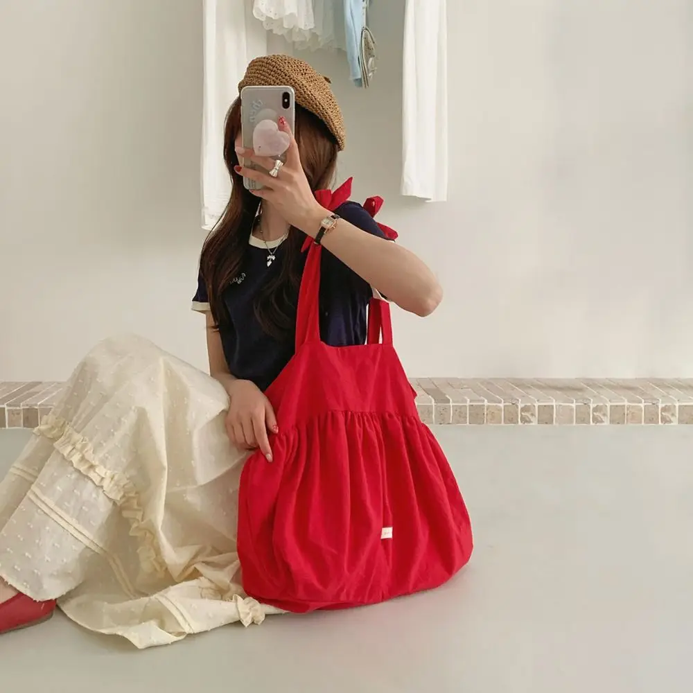 Solid Color Sweet Canvas Pleated Shoulder Bag Large Capacity Korean Style Cloth Tote Bag Casual Bow Underarm Bag Outdoor
Solid Color Sweet Canvas Pleated Shoulder Bag Large Capacity Korean Style Cloth Tote Bag Casual Bow Underarm Bag Outdoor