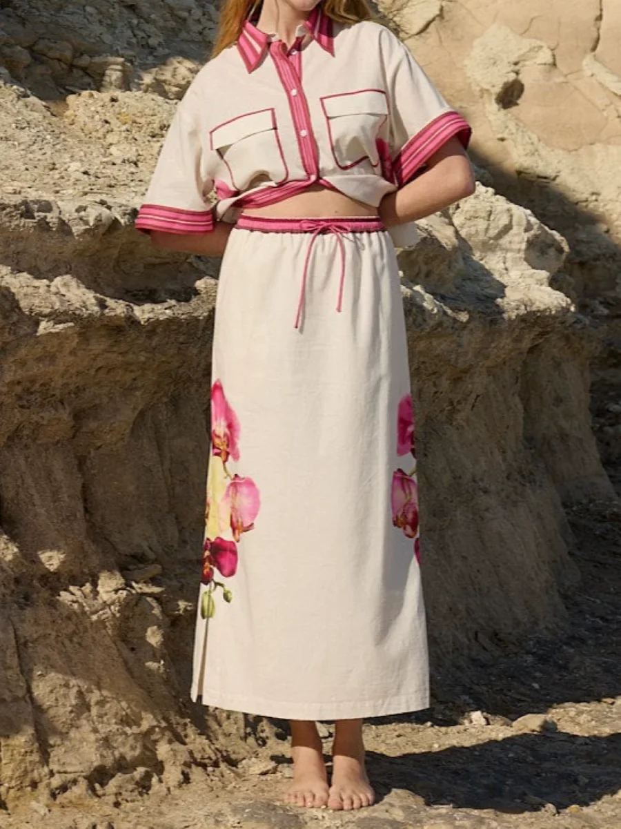 Spring 2026 Women Flower Print Set Striped Short Sleeve Turn-down Collar Single Breasted Shirt + Elastic Waist A-Line Skirt Suit
Spring 2026 Women Flower Print Set Striped Short Sleeve Turn-down Collar Single Breasted Shirt + Elastic Waist A-Line Skirt Suit