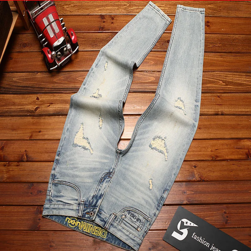 Ripped patch jeans men's fashionable streetwear slim fit small feet washed retro nostalgic stretch denim pants
Ripped patch jeans men's fashionable streetwear slim fit small feet washed retro nostalgic stretch denim pants