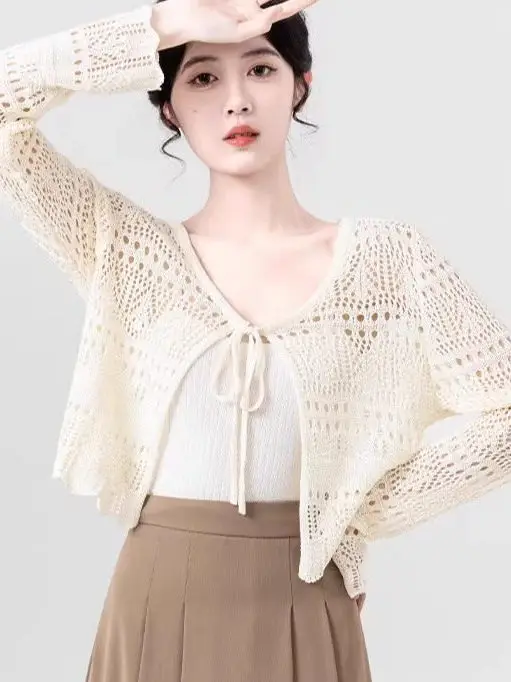 Women's Knitted Ice Silk Open Cardigan Summer New Style Air Conditioner Shirt Strap Outer Sun Protection Loose Top Casual Style
Women's Knitted Ice Silk Open Cardigan Summer New Style Air Conditioner Shirt Strap Outer Sun Protection Loose Top Casual Style