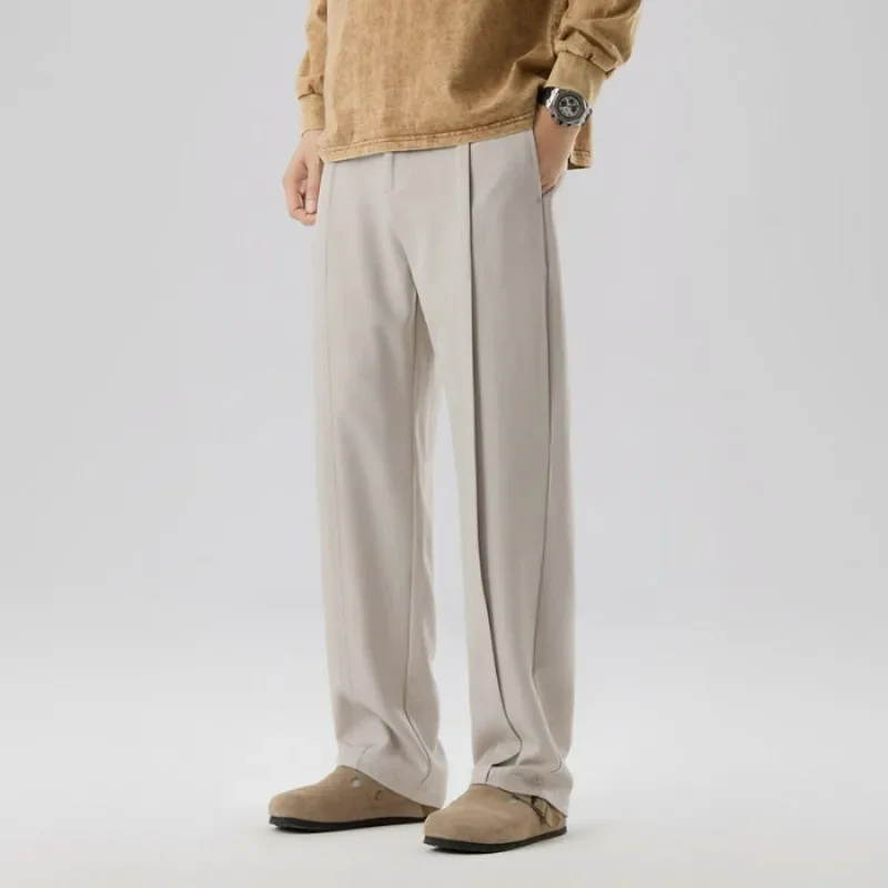 Весенние и осенние повседневные брюки высокого качества, мужские корейские модные брюки с широкими штанинами и складками, прямые свободные мужские брюки 4XL
Весенние и осенние повседневные брюки высокого качества, мужские корейские модные брюки с широкими штанинами и складками, прямые свободные мужские брюки 4XL