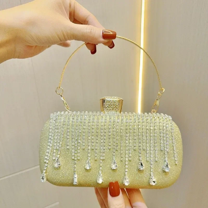 Crystal Fringe Gold Top Handle Bags Female Formal Party Rhinestone Tassels Glitter Evening Clutch with Detachable Chain Handbags
Crystal Fringe Gold Top Handle Bags Female Formal Party Rhinestone Tassels Glitter Evening Clutch with Detachable Chain Handbags