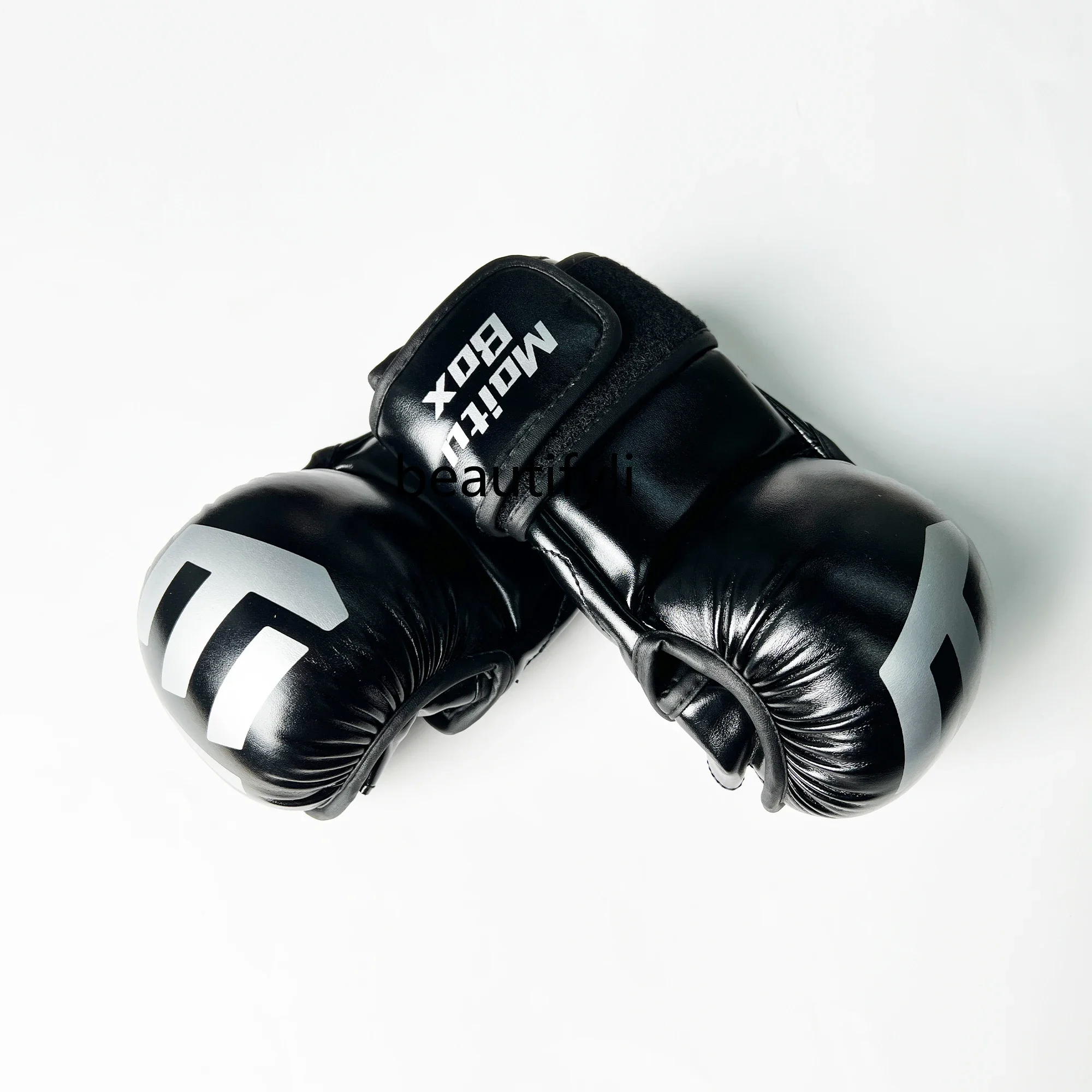 Adult boxing gloves training thickened half finger breathable wear-resistant adult, Thai boxing sandbag
Adult boxing gloves training thickened half finger breathable wear-resistant adult, Thai boxing sandbag