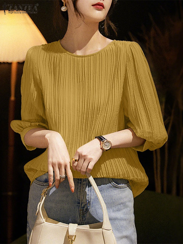 ZANZEA 2025 Fashion Blouses Women Summer 3/4 Puff Sleeve Elegant OL Shirts Casual Tunic Tops Pleated Loose Solid Color Blusas
ZANZEA 2025 Fashion Blouses Women Summer 3/4 Puff Sleeve Elegant OL Shirts Casual Tunic Tops Pleated Loose Solid Color Blusas