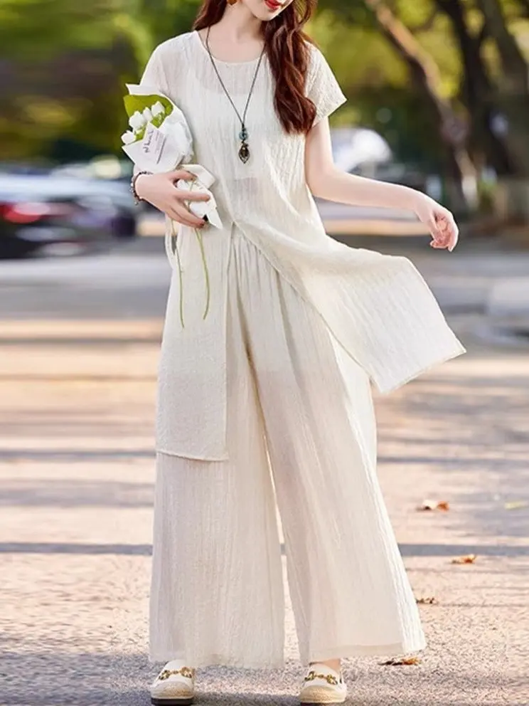 Комплект из двух предметов: свободные брюки с широкими штанинами и топ с тонкими складками, летний женский костюм из высококачественного хлопкового смесового материала
Комплект из двух предметов: свободные брюки с широкими штанинами и топ с тонкими складками, летний женский костюм из высококачественного хлопкового смесового материала