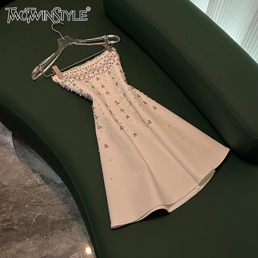 TWOTWINSTYLE шикарные платья с бриллиантами для женщин, без бретелек, без рукавов, с высокой талией, утягивающее однотонное мини-платье, женское TDR641126
TWOTWINSTYLE шикарные платья с бриллиантами для женщин, без бретелек, без рукавов, с высокой талией, утягивающее однотонное мини-платье, женское TDR641126