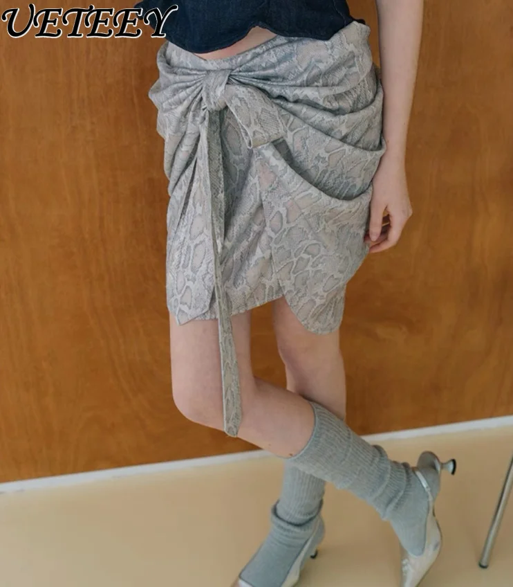 Summer 2025 New Fashion Spice Girl Sweet and Spicy Design Snakeskin Pattern Skirt Fashionable Metal Strap Irregular Mini Skirt
Summer 2025 New Fashion Spice Girl Sweet and Spicy Design Snakeskin Pattern Skirt Fashionable Metal Strap Irregular Mini Skirt