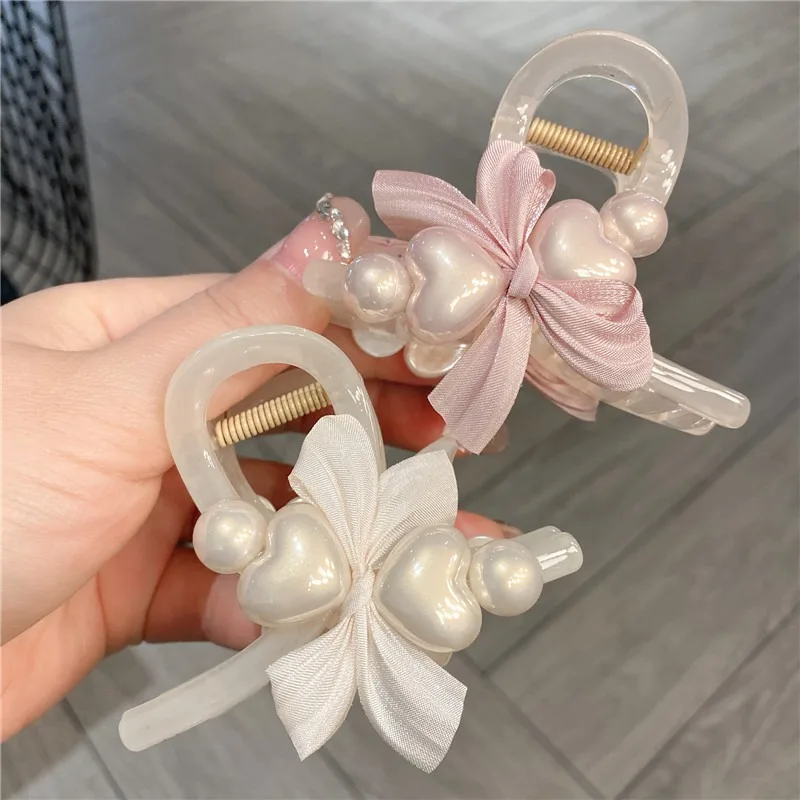 DS Sweet Pearl Love Bow Hair Claw 8CM Medium Size Plastic Claw Clips Trendy Crab Hair Clips Hair Accessories for Women Girls
DS Sweet Pearl Love Bow Hair Claw 8CM Medium Size Plastic Claw Clips Trendy Crab Hair Clips Hair Accessories for Women Girls