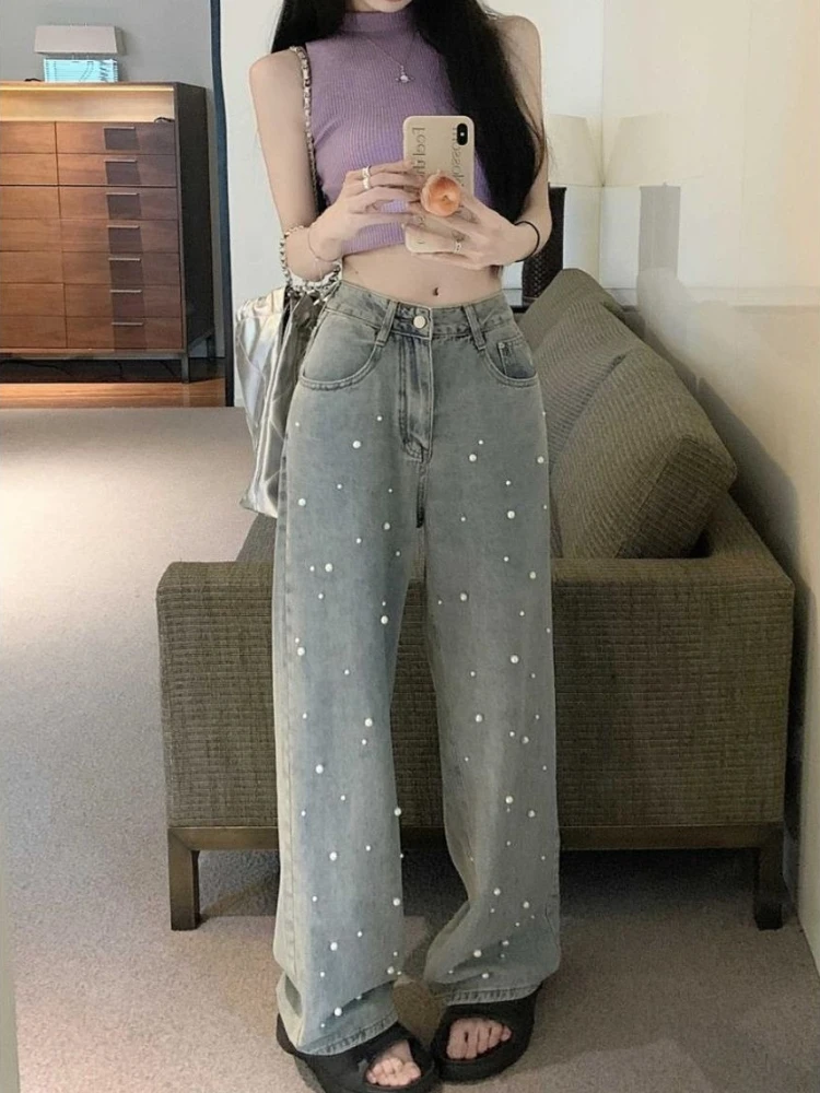 2026 Summer Trendy Women's Pearl Detailed Jeans with Relaxed High Waist Wide Bottom Slimming Maxi Length Drape for Casual Style
2026 Summer Trendy Women's Pearl Detailed Jeans with Relaxed High Waist Wide Bottom Slimming Maxi Length Drape for Casual Style