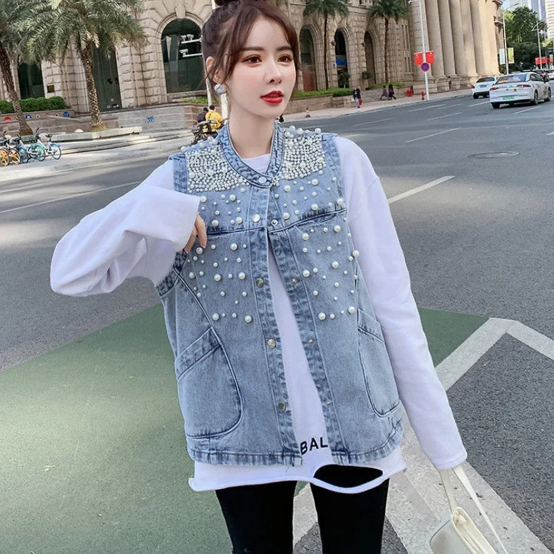 Pearls Single-breasted Denim Vest Women Sleeveless Jacket Cardigan Korean Fashion Coat Streetwear Pockets Jacket
Pearls Single-breasted Denim Vest Women Sleeveless Jacket Cardigan Korean Fashion Coat Streetwear Pockets Jacket