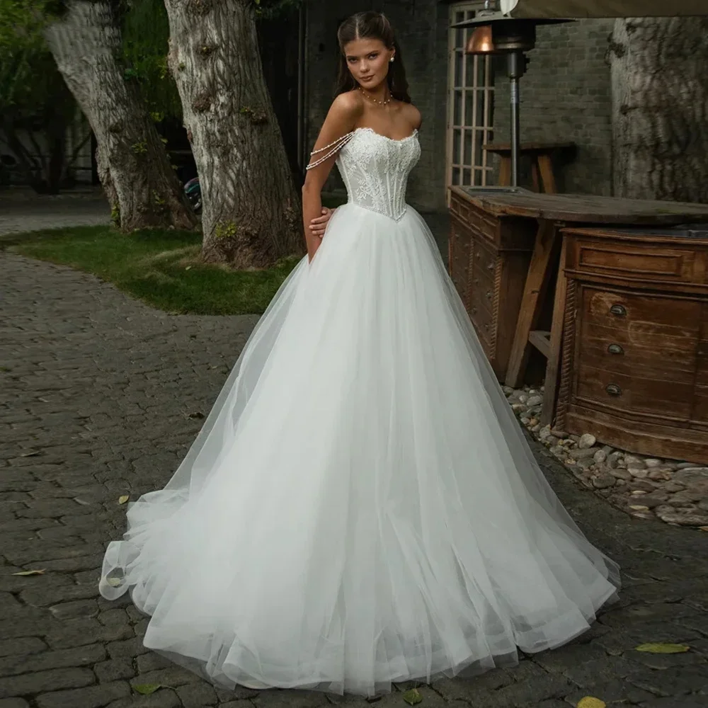 Exquisite and Elegant A-line Strapless Tulle Wedding Dress, Beaded Lace Bridal Gown with Court Train, Customizable.
Exquisite and Elegant A-line Strapless Tulle Wedding Dress, Beaded Lace Bridal Gown with Court Train, Customizable.