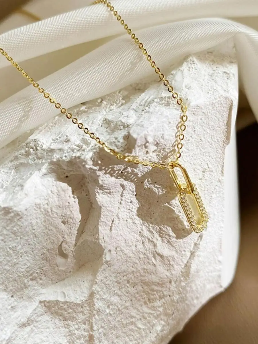 Gold-Tone Rectangular CZ-Embellished Geometric Pendant Chain Necklace For Women Everyday Styling
Gold-Tone Rectangular CZ-Embellished Geometric Pendant Chain Necklace For Women Everyday Styling