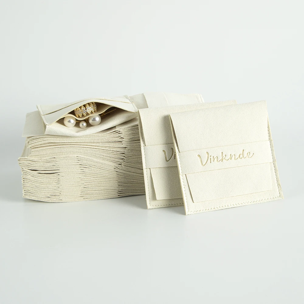 50Pcs Custom Logo Ivory Microfiber Envelope Jewelry Bag Suede Flap Strip Pouch Ring Earrings Seperately Protect Wedding Favors
50Pcs Custom Logo Ivory Microfiber Envelope Jewelry Bag Suede Flap Strip Pouch Ring Earrings Seperately Protect Wedding Favors