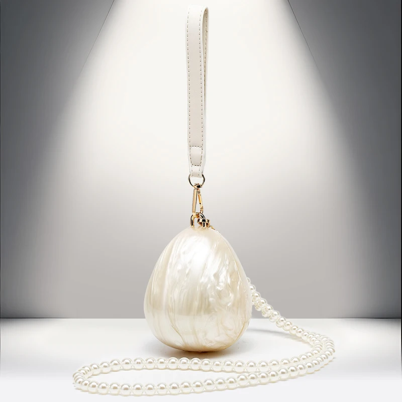 Luxury brand bag, shaped shell acrylic bag, fashionable wedding and dinner handbag, women's single shoulder diagonal cross bag
Luxury brand bag, shaped shell acrylic bag, fashionable wedding and dinner handbag, women's single shoulder diagonal cross bag