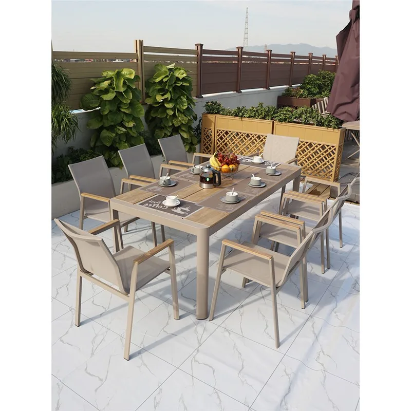 Outdoor table and chair combination courtyard garden open-air waterproof plastic wood long table barbecue table preservative woo
Outdoor table and chair combination courtyard garden open-air waterproof plastic wood long table barbecue table preservative woo