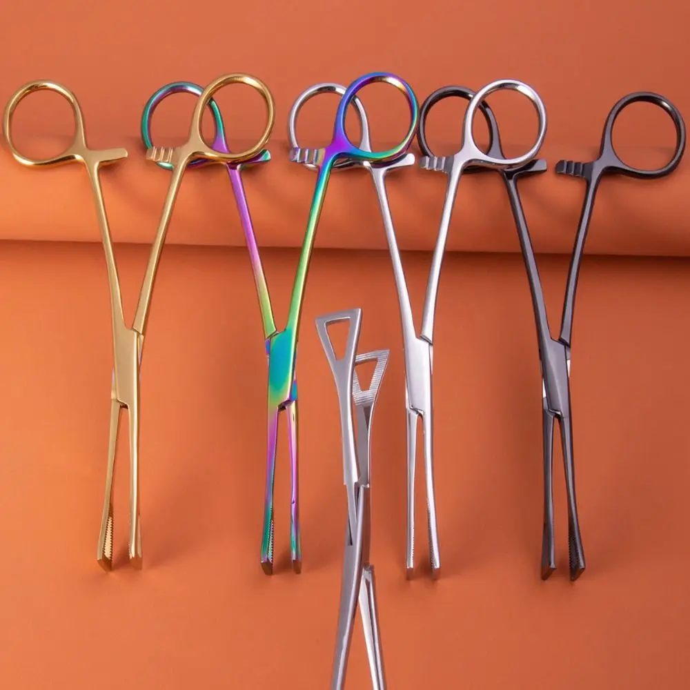 Body Jewelry Tool Stainless Steel Piercing Clamp Piercing Tools Puncture Tool Disposable Professional Tool Triangle Tweezers
Body Jewelry Tool Stainless Steel Piercing Clamp Piercing Tools Puncture Tool Disposable Professional Tool Triangle Tweezers