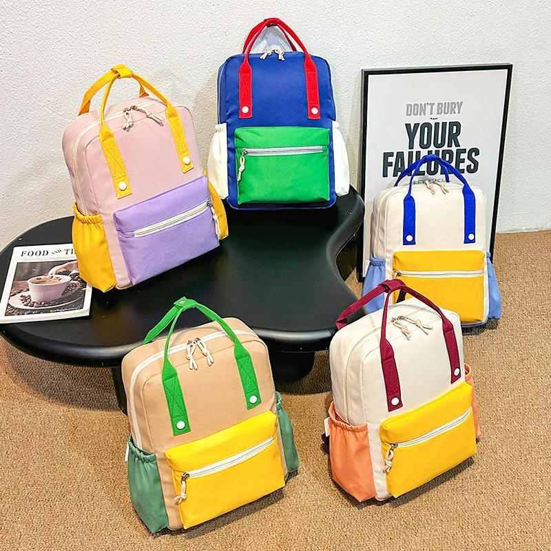 Lightweight nylon kindergarten schoolbag, cute color-blocking spliced children's waterproof hand-held backpack
Lightweight nylon kindergarten schoolbag, cute color-blocking spliced children's waterproof hand-held backpack