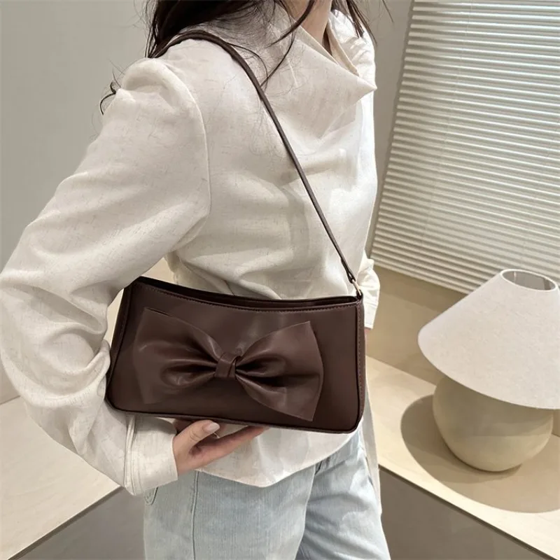 Women's Minimalist Faux Leather Hobo Bag with Bow Detail, Casual Style for Daily Use Shopping, Dating, Commuting and Short Trips
Women's Minimalist Faux Leather Hobo Bag with Bow Detail, Casual Style for Daily Use Shopping, Dating, Commuting and Short Trips
