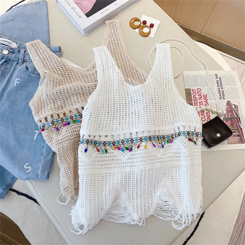 Summer Women Retro Hollow Embroidery V-neck Sleeveless Loose Tassel Knitted Camisole
Summer Women Retro Hollow Embroidery V-neck Sleeveless Loose Tassel Knitted Camisole