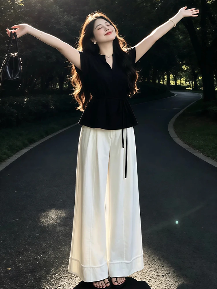 Fashionable Black Short Sleeve T-Shirt And Wide Leg Pants Women's Summer Outfit Two-Piece Set Breathable Casual Style Ensemble
Fashionable Black Short Sleeve T-Shirt And Wide Leg Pants Women's Summer Outfit Two-Piece Set Breathable Casual Style Ensemble