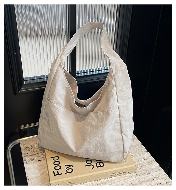 Вместительная холщовая сумка для женщин, универсальная минималистичная ретро-сумка через плечо, корейская сумка-шоппер в стиле slouchy для повседневного использования.
Вместительная холщовая сумка для женщин, универсальная минималистичная ретро-сумка через плечо, корейская сумка-шоппер в стиле slouchy для повседневного использования.