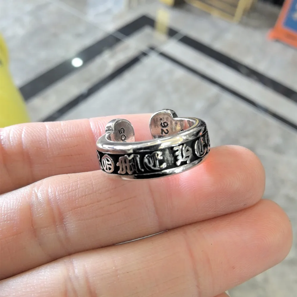 Trendy and trendy punk hip-hop embossed large scroll 925 sterling silver ring with vintage men's and women's letters open ring
Trendy and trendy punk hip-hop embossed large scroll 925 sterling silver ring with vintage men's and women's letters open ring